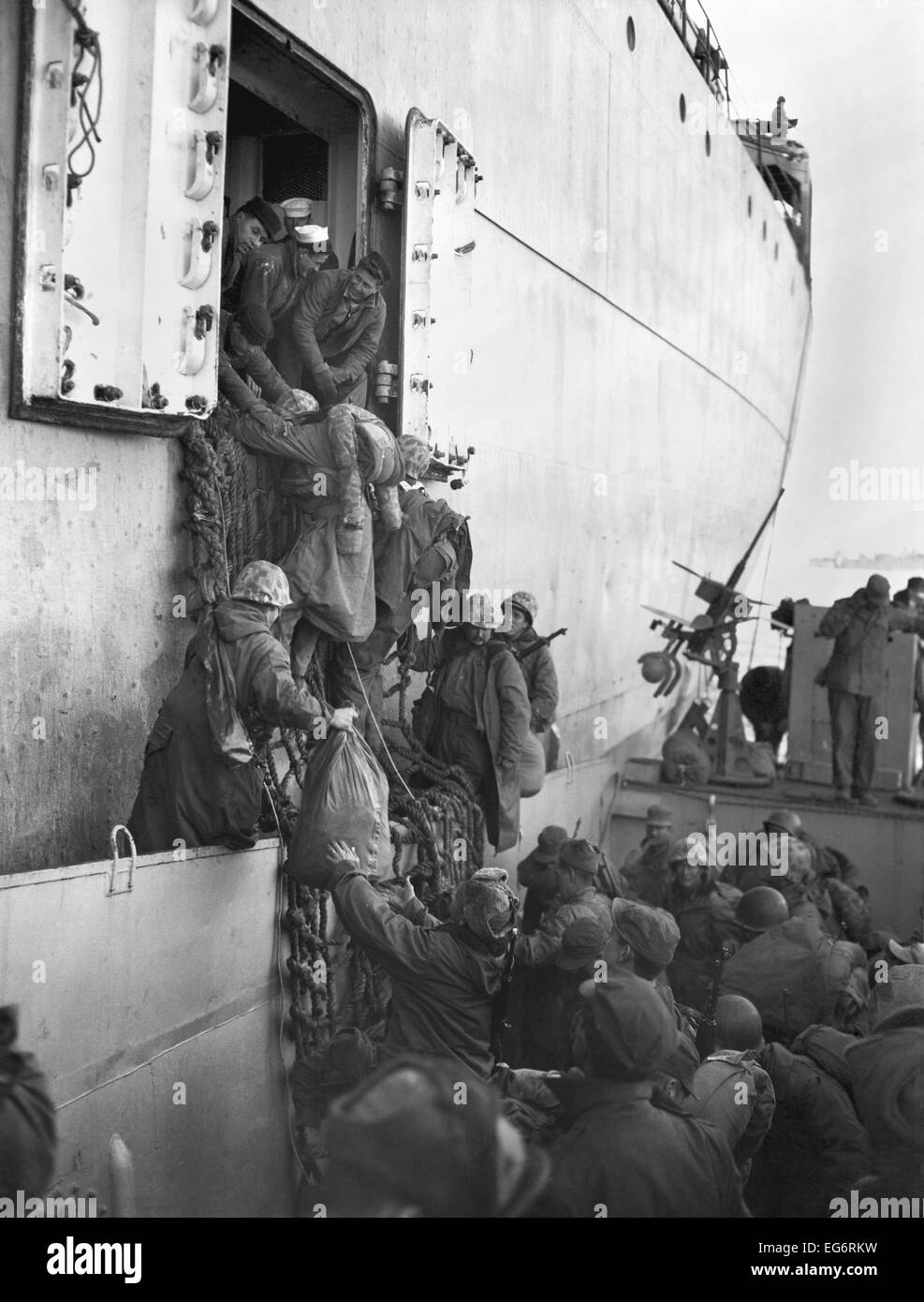 U.S. Marines board a ship for evacuation from Hungnam, North Korea, after their withdrawal from the Chosin Reservoir on Dec. Stock Photo