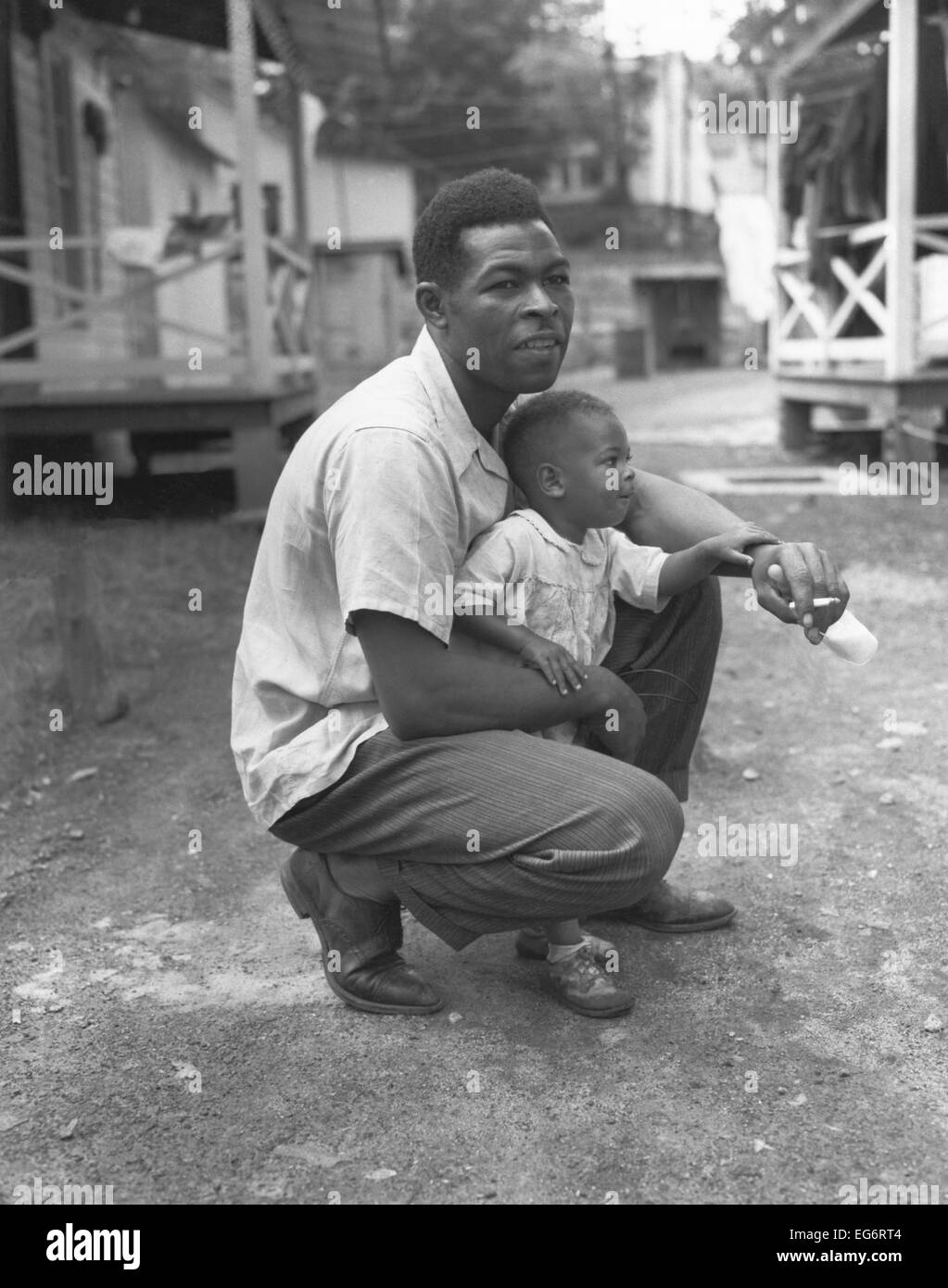 African American miner with his little boy. Grant Town, Marion County, West Virginia. June 13, 1946. Photo by Russell Lee. Stock Photo