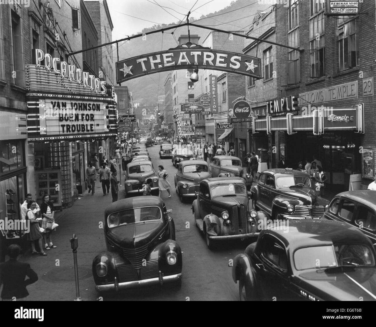 Saturday afternoon street scene in Welch, the county seat of McDowell County, West Virginia. August 8, 1946. With railroads and Stock Photo