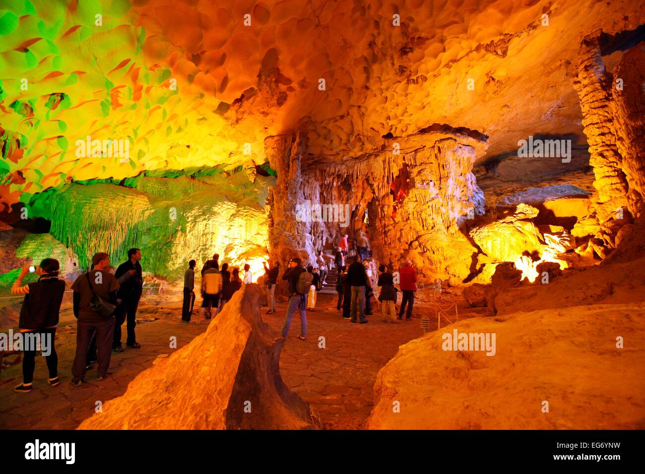 Visitors at Hang Sung Sot cave at Ha Long Bay in the Gulf of Tonkin, Vietnam. Stock Photo