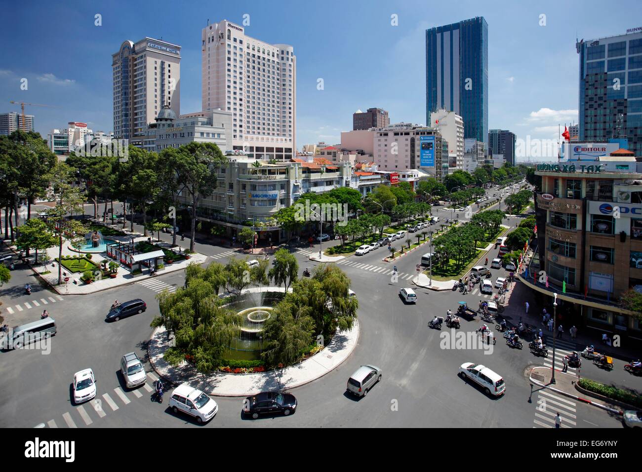 View from Hotel Rex on roundabout traffic and high towers in Ho Chi Minh City, Vietnam. Stock Photo
