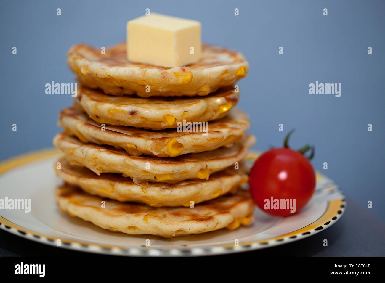 corn fritters flapjacks cheese and tomatoe Stock Photo Alamy