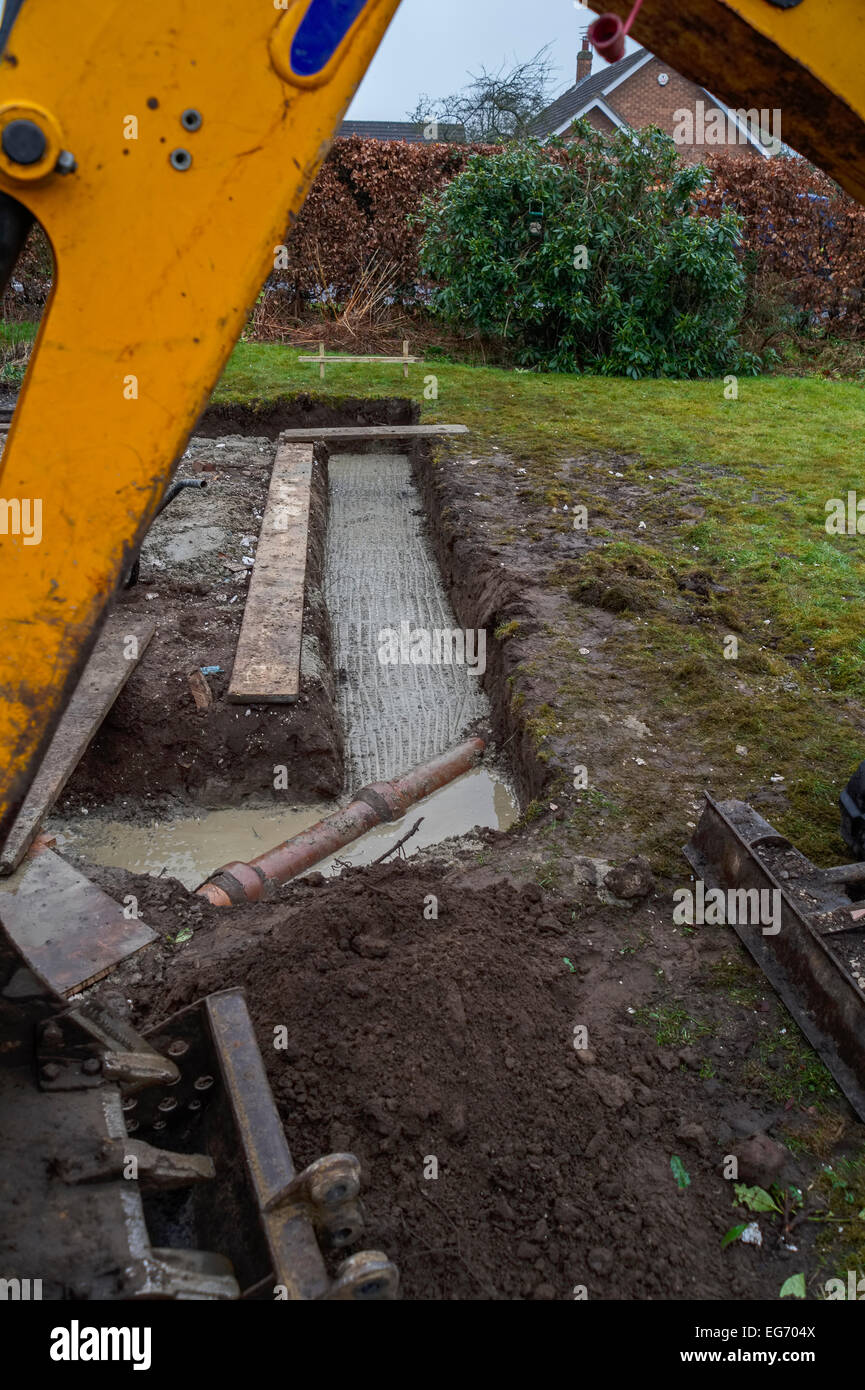 A dug trench for footings foundations for a domestic extension home improvement renovation. Vertical format with copyspace Stock Photo