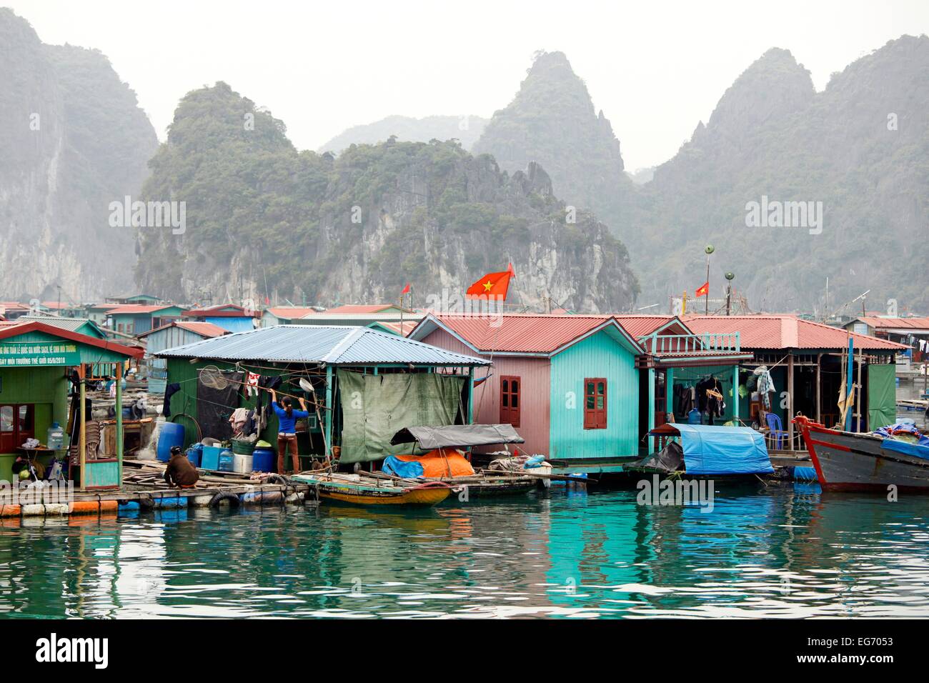 Houseboats and fish farms at Ha Long Bay at Cat Ba National Park, Vietnam. Stock Photo