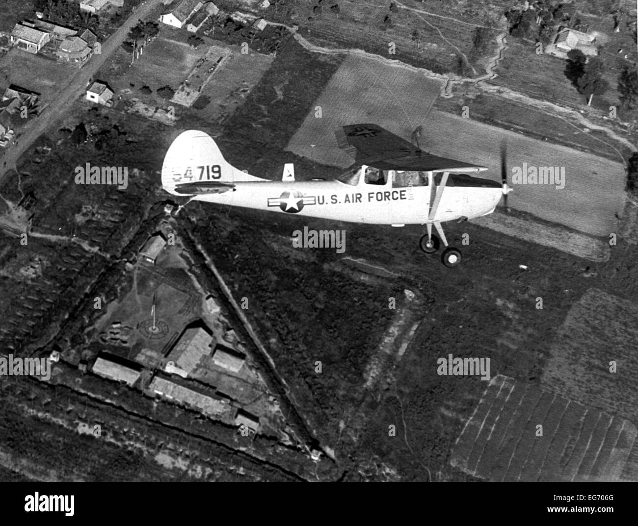 A reconnaissance aircraft type O1-E 'Bird Dog' is flying over a US base in South Vietnam. Undated picture. Stock Photo