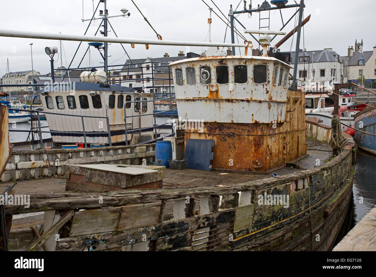 Derelict fishing trawler Stornaway harbour Outer Hebrides Scotland Stock Photo