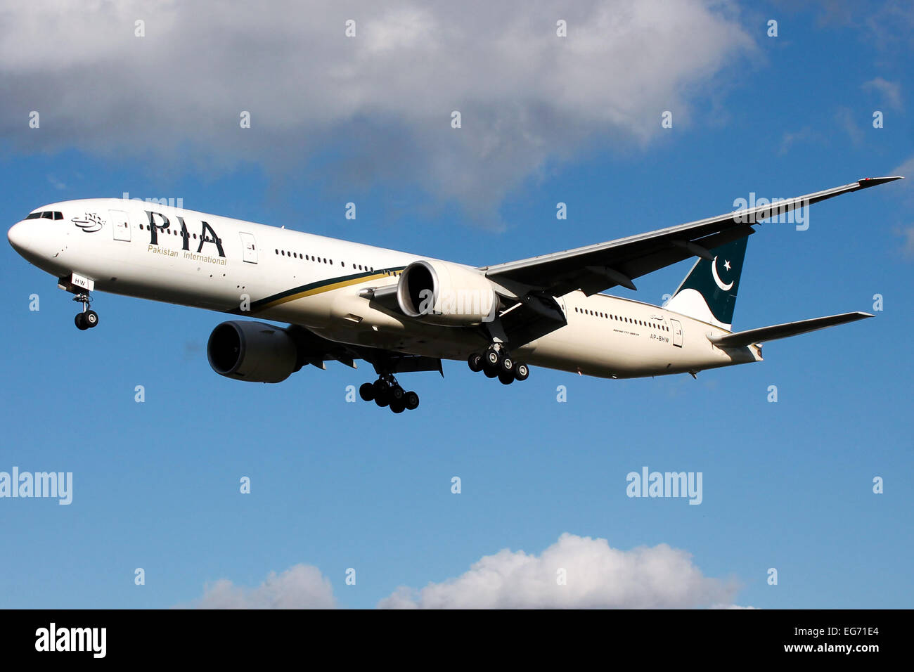 Pakistan International Airlines Boeing 777-300 approaches runway 27L at London Heathrow airport. Stock Photo