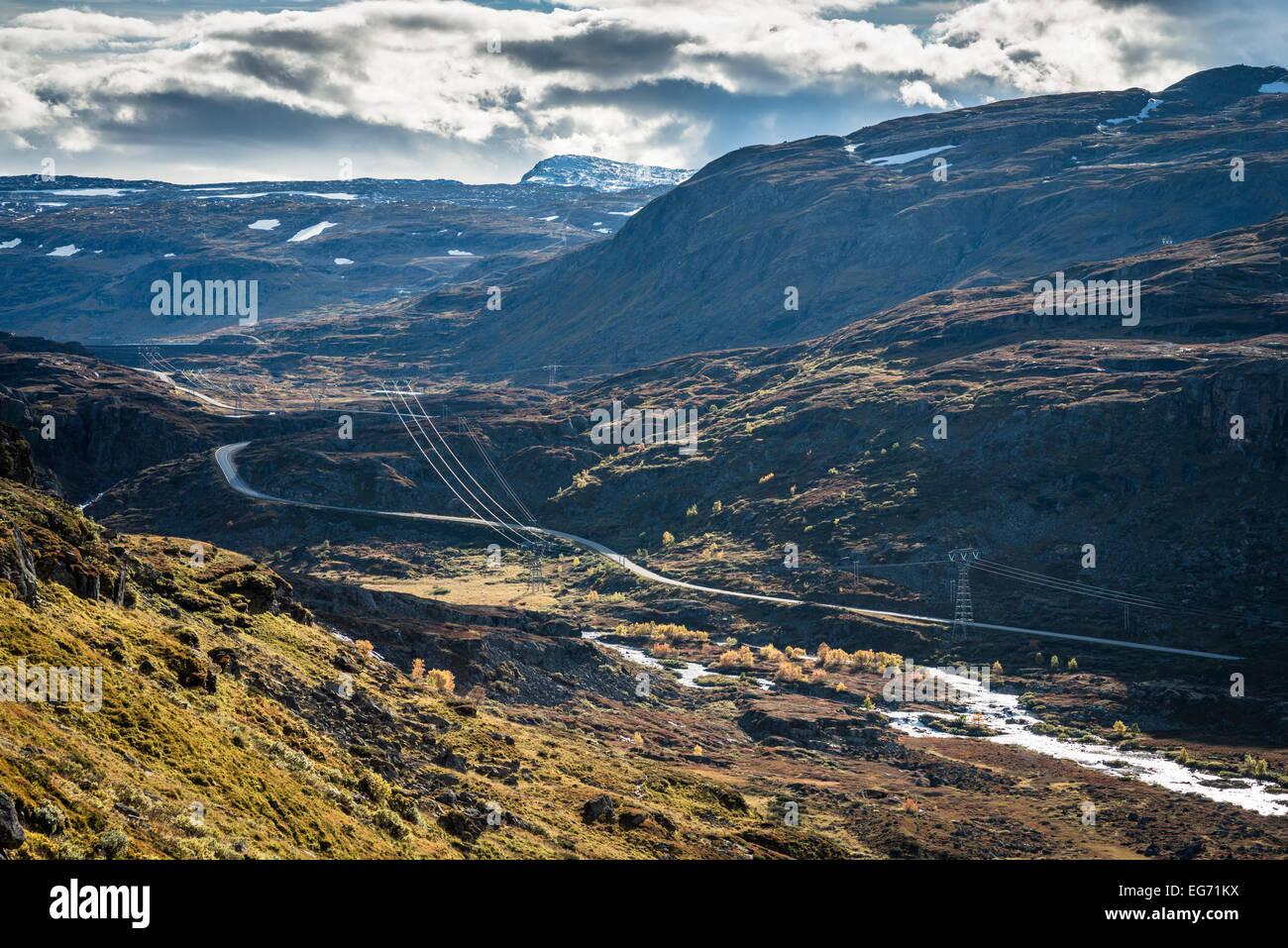 Skarvheimen, Norway - road and power lines in Stemmerdalen, at the head of Aurlandsdalen Stock Photo