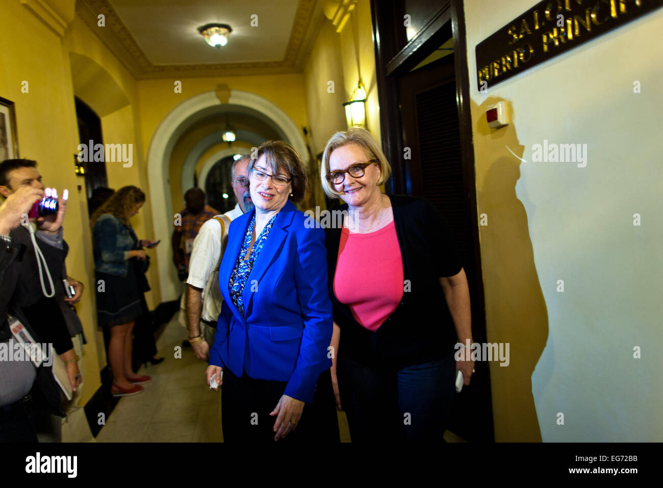 Havana, Cuba. 17th Feb, 2015. U.S. Senators Amy Klobuchar (L) and Claire McCaskill (R) leave after attending a press conference in Havana, Cuba, on Feb. 17, 2015. The United States and Cuba will hold a new round of talks on normalized ties here at the end of this month, the State Department confirmed on Tuesday. Credit:  Liu Bin/Xinhua/Alamy Live News Stock Photo