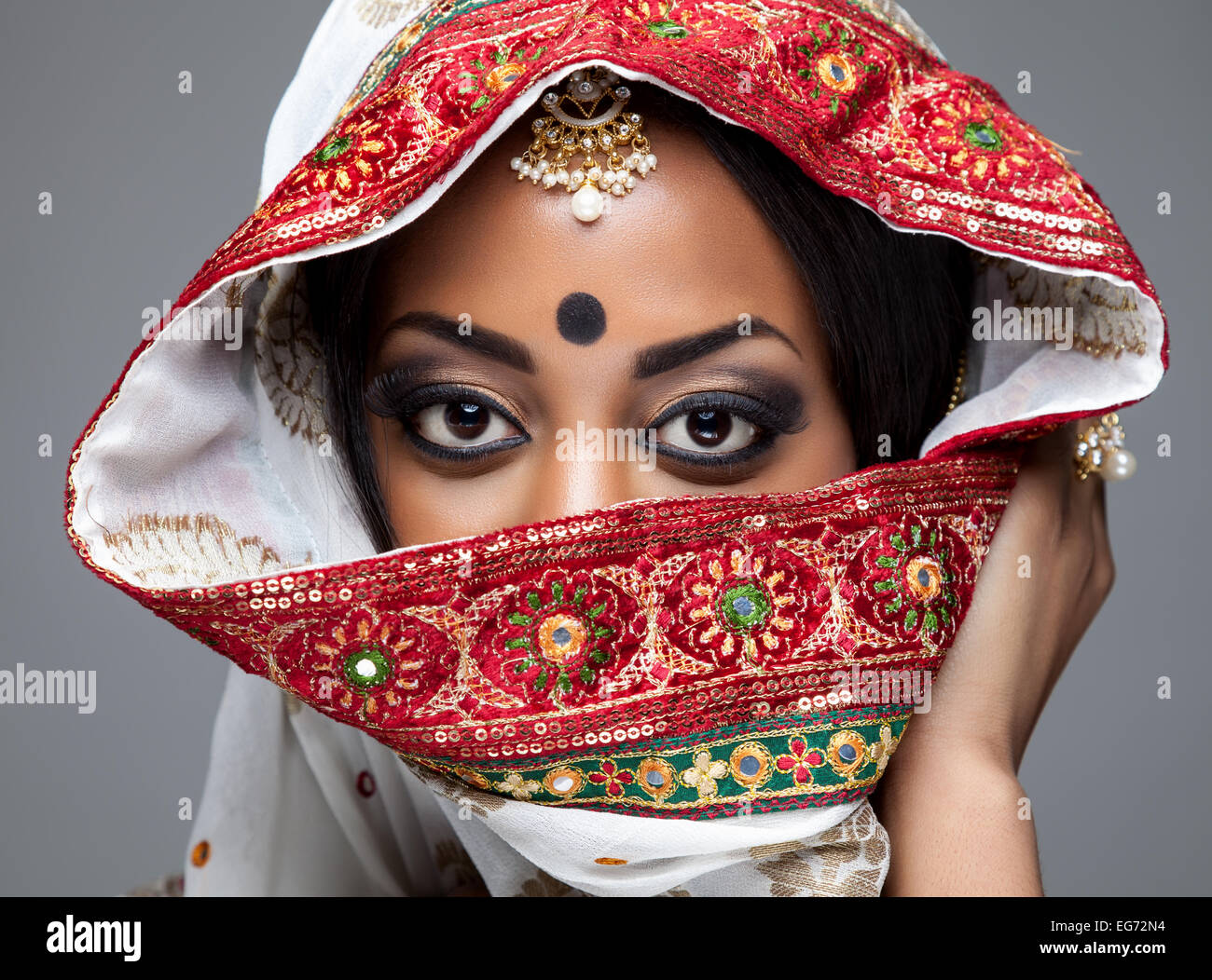 Exotic Indian bride dressed up for wedding ceremony Stock Photo