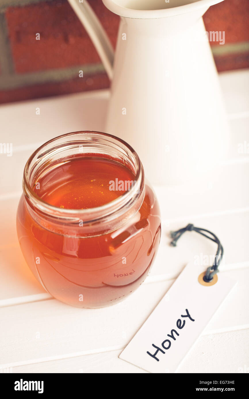 the honey in jar and label Stock Photo