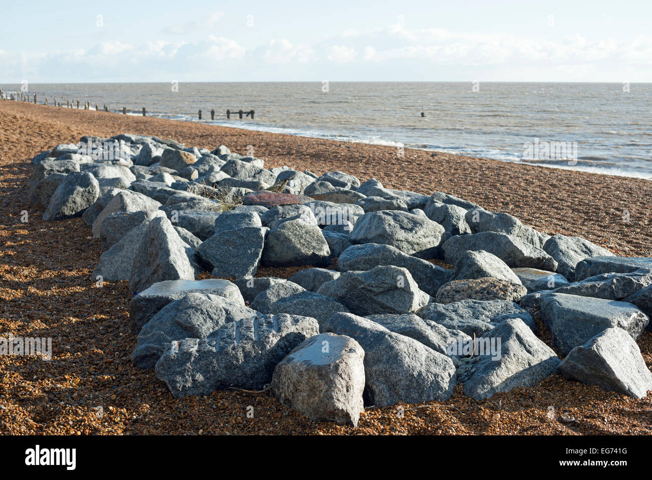 Rock armour, leftover from coastal defence work at Bawdsey Ferry, Suffolk, UK. Stock Photo