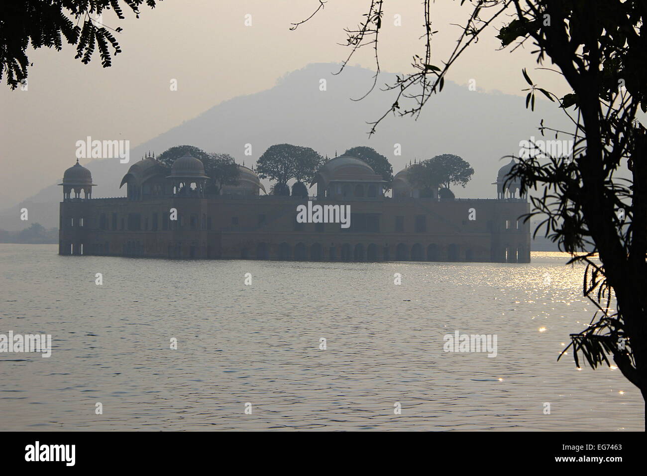 Early morning view of Jalmahal Summer Palace at Jaipur, Rajasthan, India, Asia, situated in the middle of lake, framed with silh Stock Photo