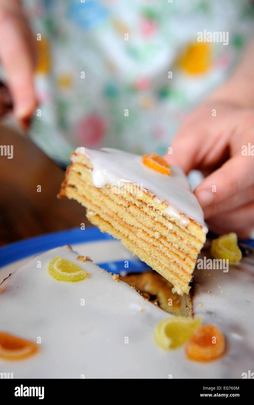 A home baker baking a Baumtorte cake UK Stock Photo