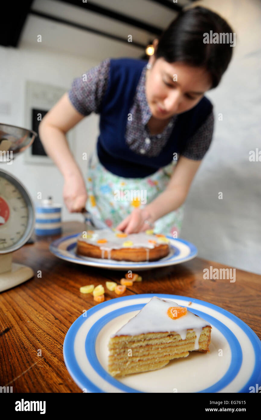 A home baker baking a Baumtorte cake UK Stock Photo