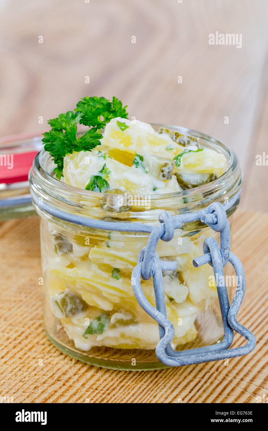 Potato salad in a jar on wooden Stock Photo - Alamy