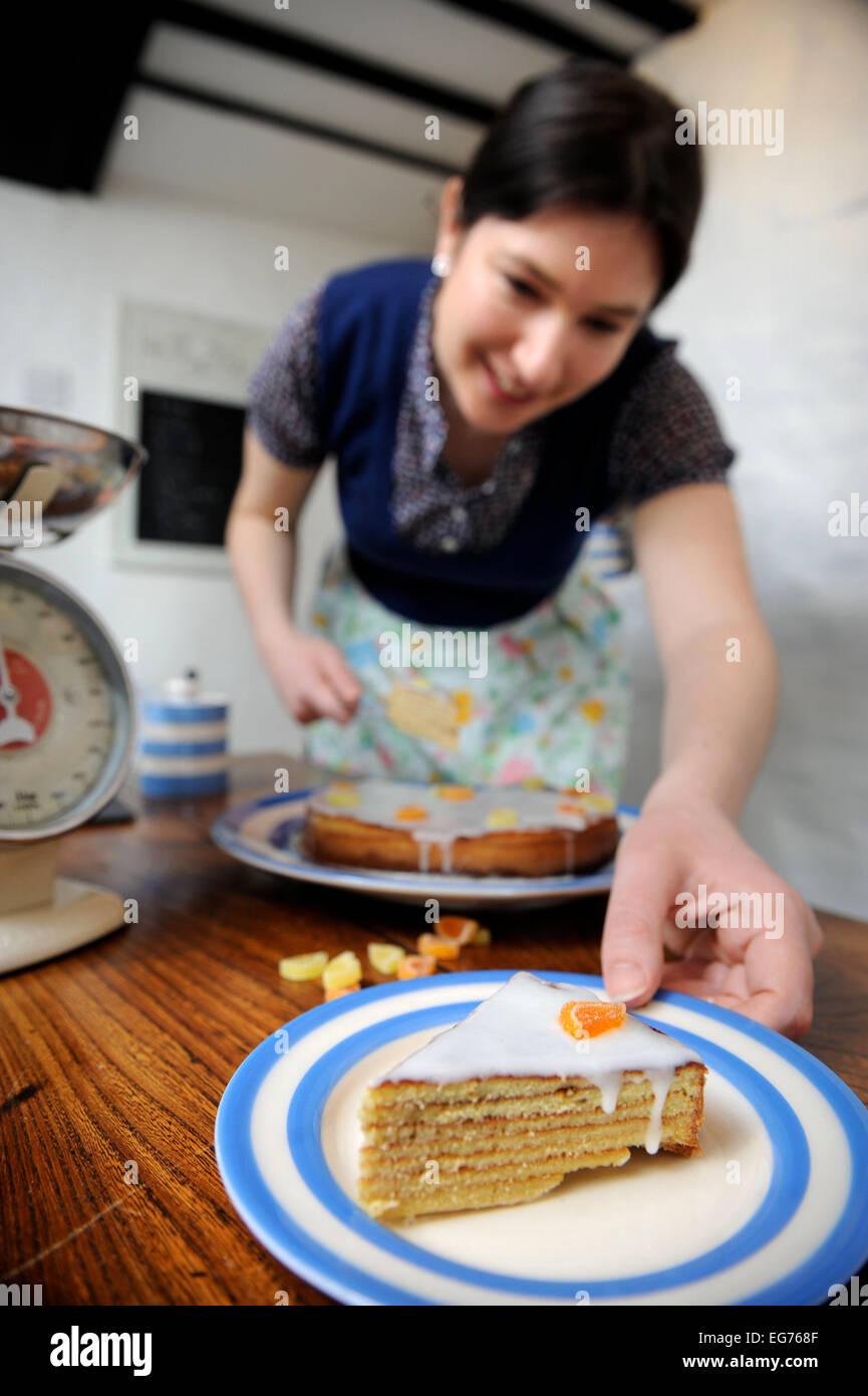 A home baker baking a Baumtorte cake UK Stock Photo