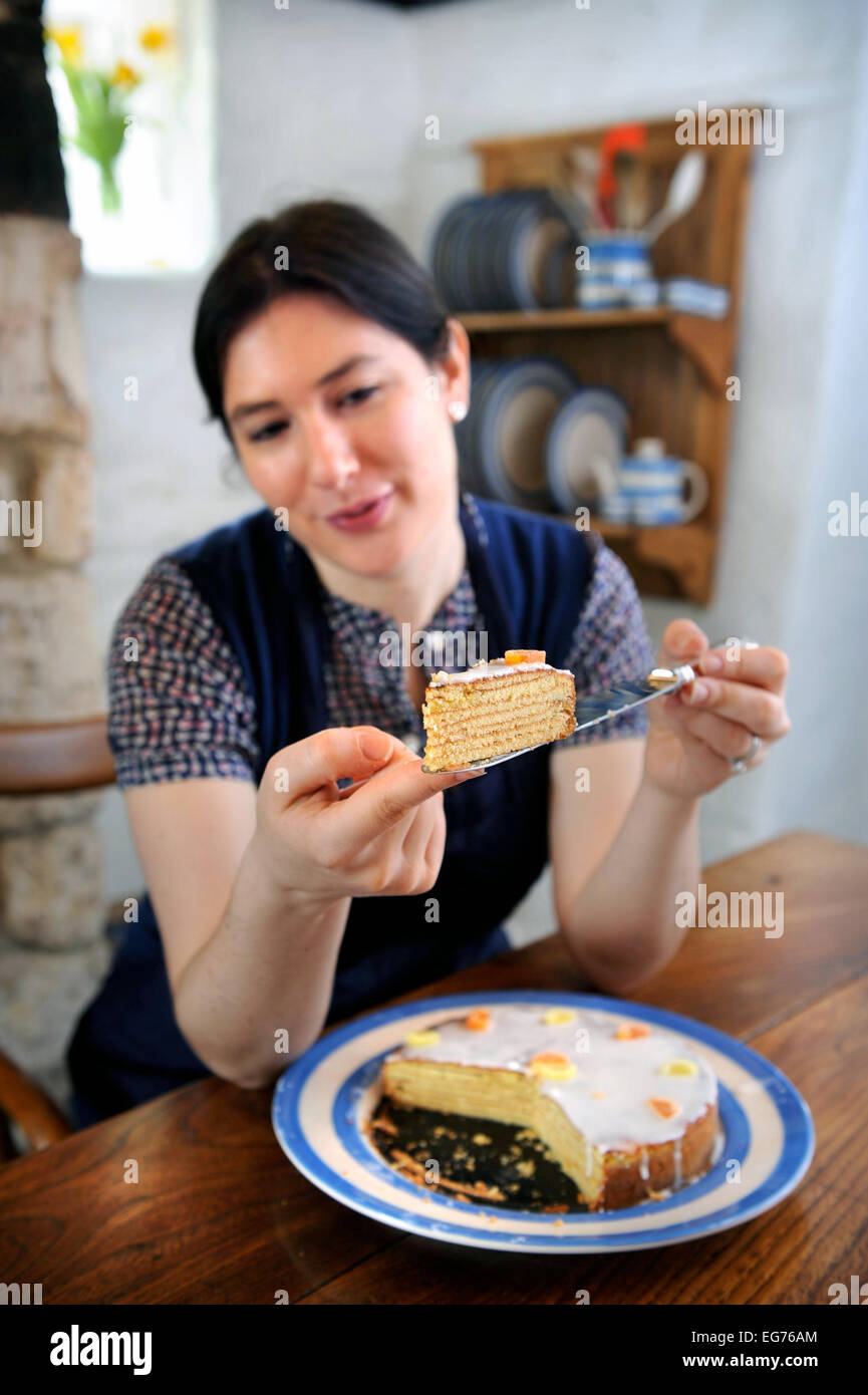 A home baker baking a Baumtorte cake UK Stock Photo