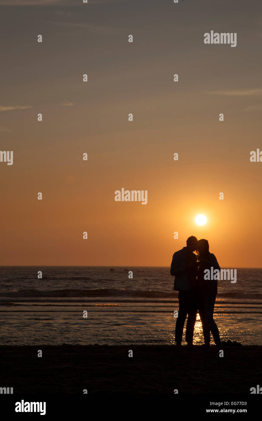 Netherlands, Bloemendaal, lovers on beach at sunset Stock Photo