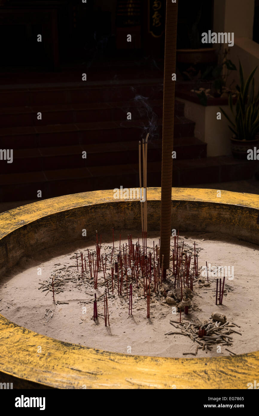 Incense sticks burning in temple hi-res stock photography and images ...