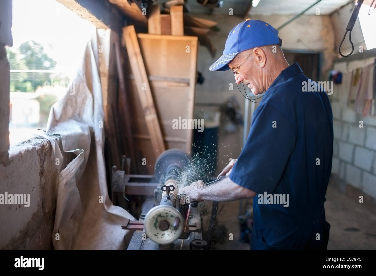 Cuba, Matanzas, Jaguey Grande, woodworker at his workshop Stock Photo