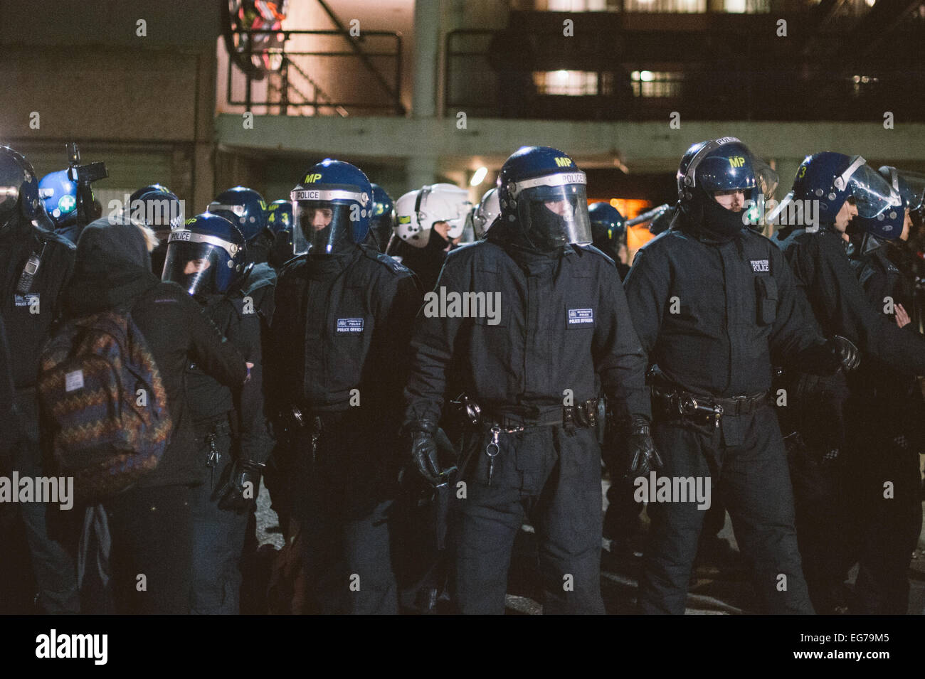 London, UK. 17th February, 2015. The eviction at Aylesbury Estate, 77 – 105 Chartridge, Westmoreland Road on 17th February 2015 of housing activists on one of europe's largest Estates.  Protesters gathered as police in riot gear cut down barricades and make arrests. Credit: Richard Skinner/Alamy Live News Stock Photo