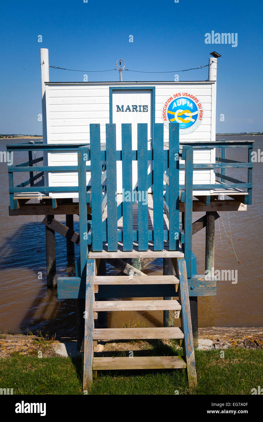 entrance to traditional fishing hut on stilts with words Marie on door Stock Photo