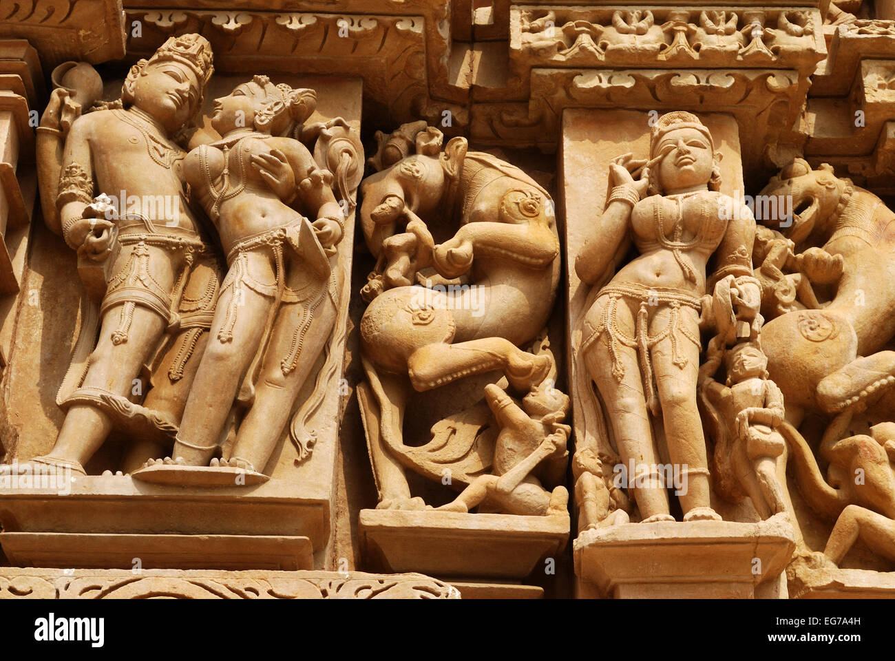 stone carved sculptures of hindu gods at khajuraho temple india Stock Photo
