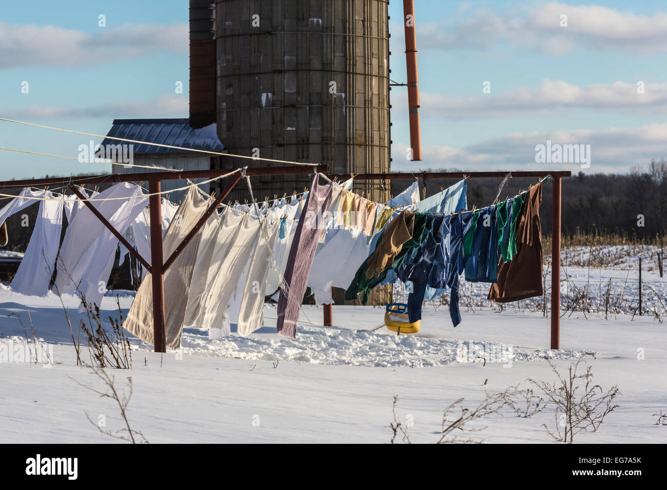 Amish laundry on a Monday, hung on clotheslines outside to dry, near  Stanwood in Central Michigan, USA Stock Photo - Alamy