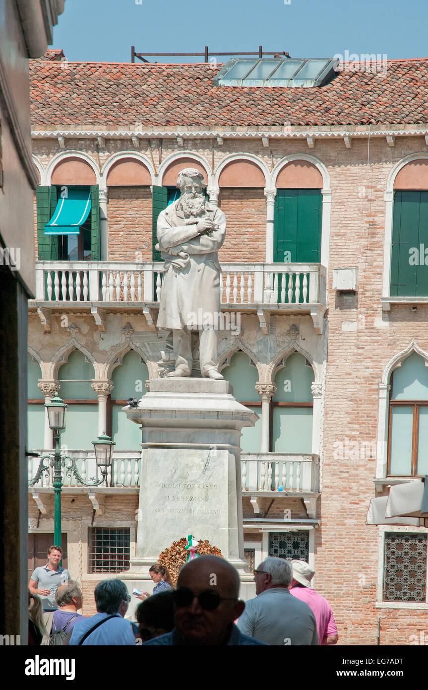Statue of Niccolo Tommaseo linguist and author of eight volume dictionary of Italian language in Campo San Stefano Venice Italy Stock Photo