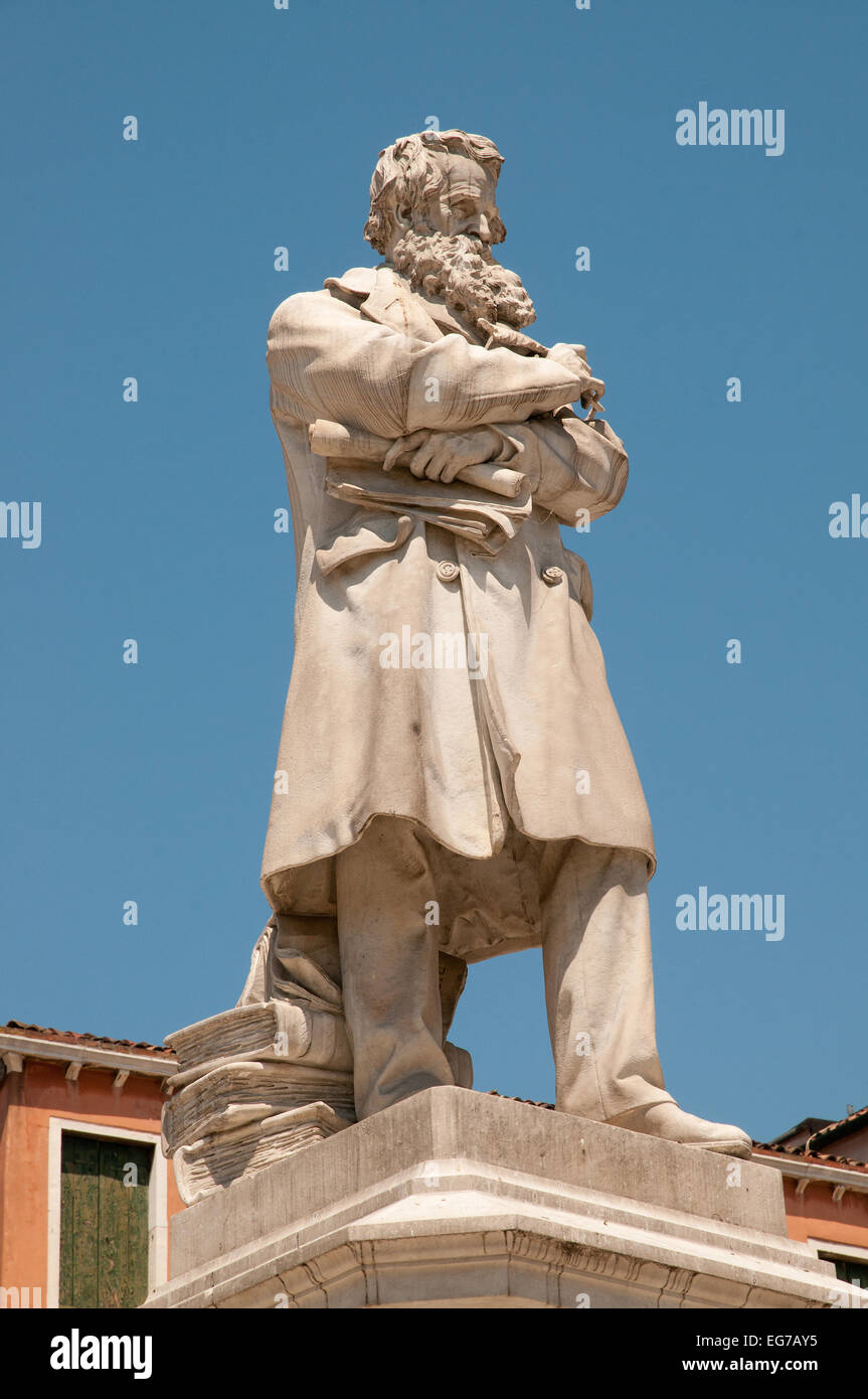 Statue of Niccolo Tommaseo linguist and author of eight volume dictionary of Italian language in Campo San Stefano Venice Italy Stock Photo