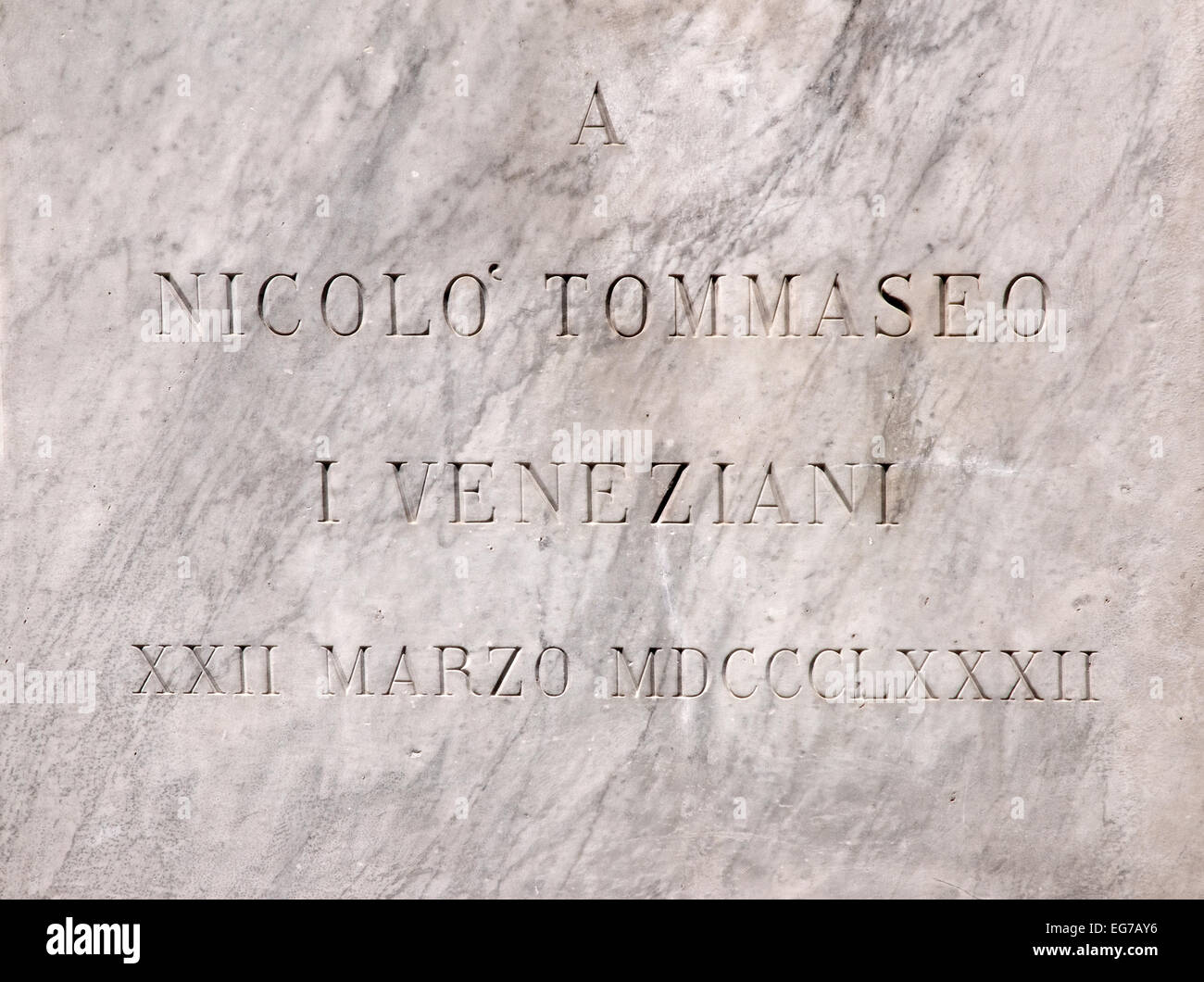 Plaque on statue of author and linguist Niccolo Tommaseo in Campo San Stefano Venice Italy Stock Photo