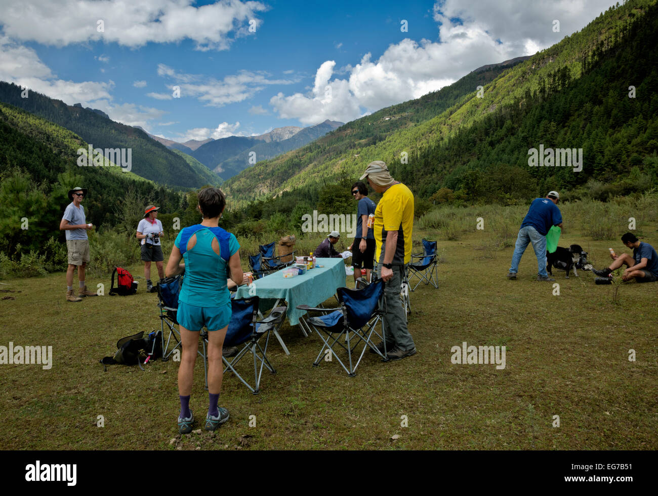 BHUTAN - Trekkers stop for a sumptuous lunch in the Paro River Valley on their way to the first camp of the Jhomolhari 2 Trek. Stock Photo