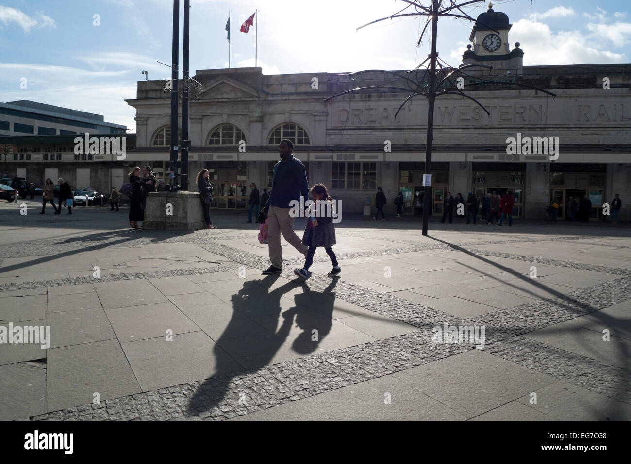 Cardiff, Wales, UK. 18th February, 2015. Sunshine at Cardiff Railway Station as parents bring children to the capital during half term week in Wales. Credit:  Kathy deWitt/Alamy Live News Stock Photo