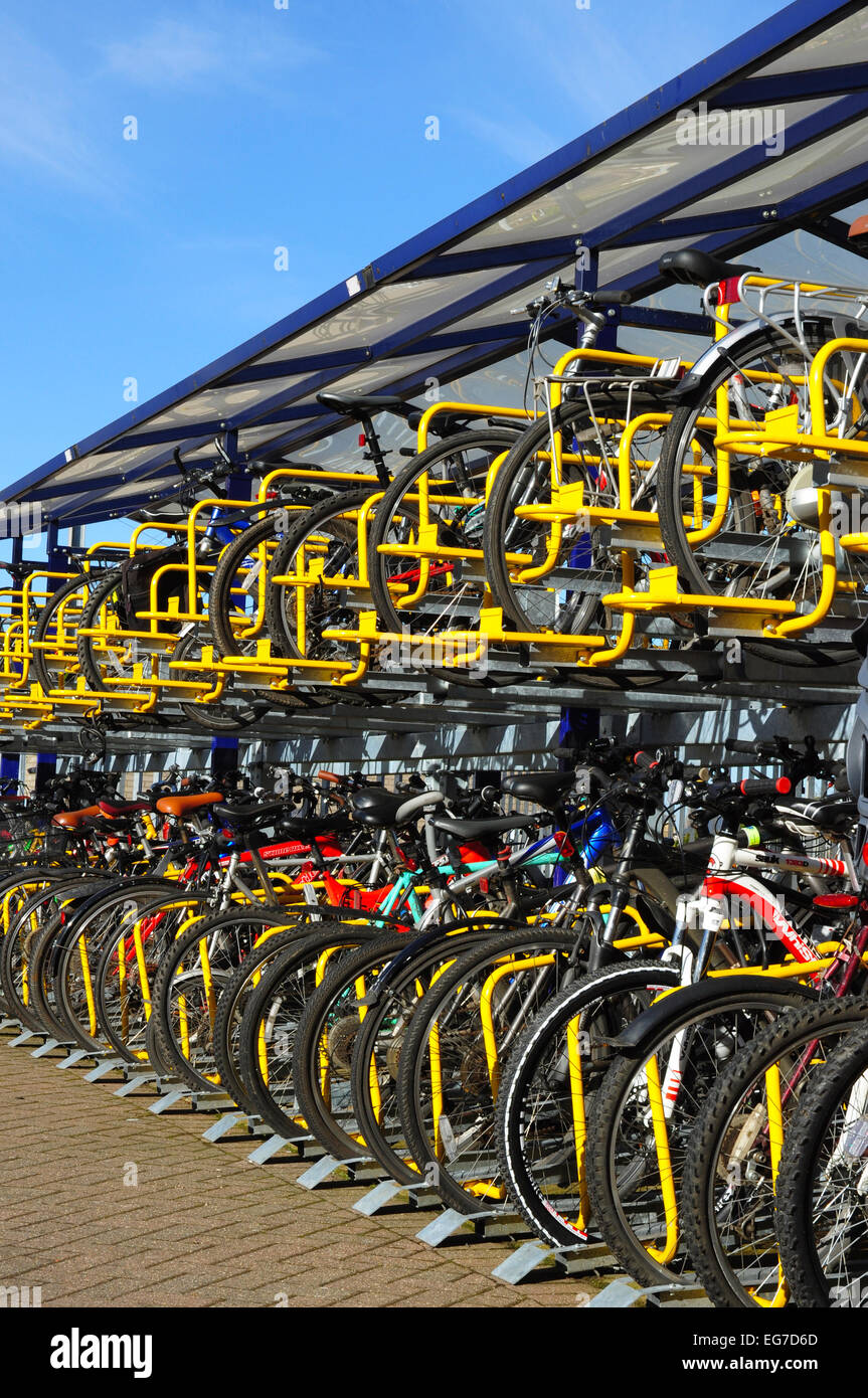 Cycle racks, Hitchin Railway Station, Hertfordshire, England, UK. Stock Photo