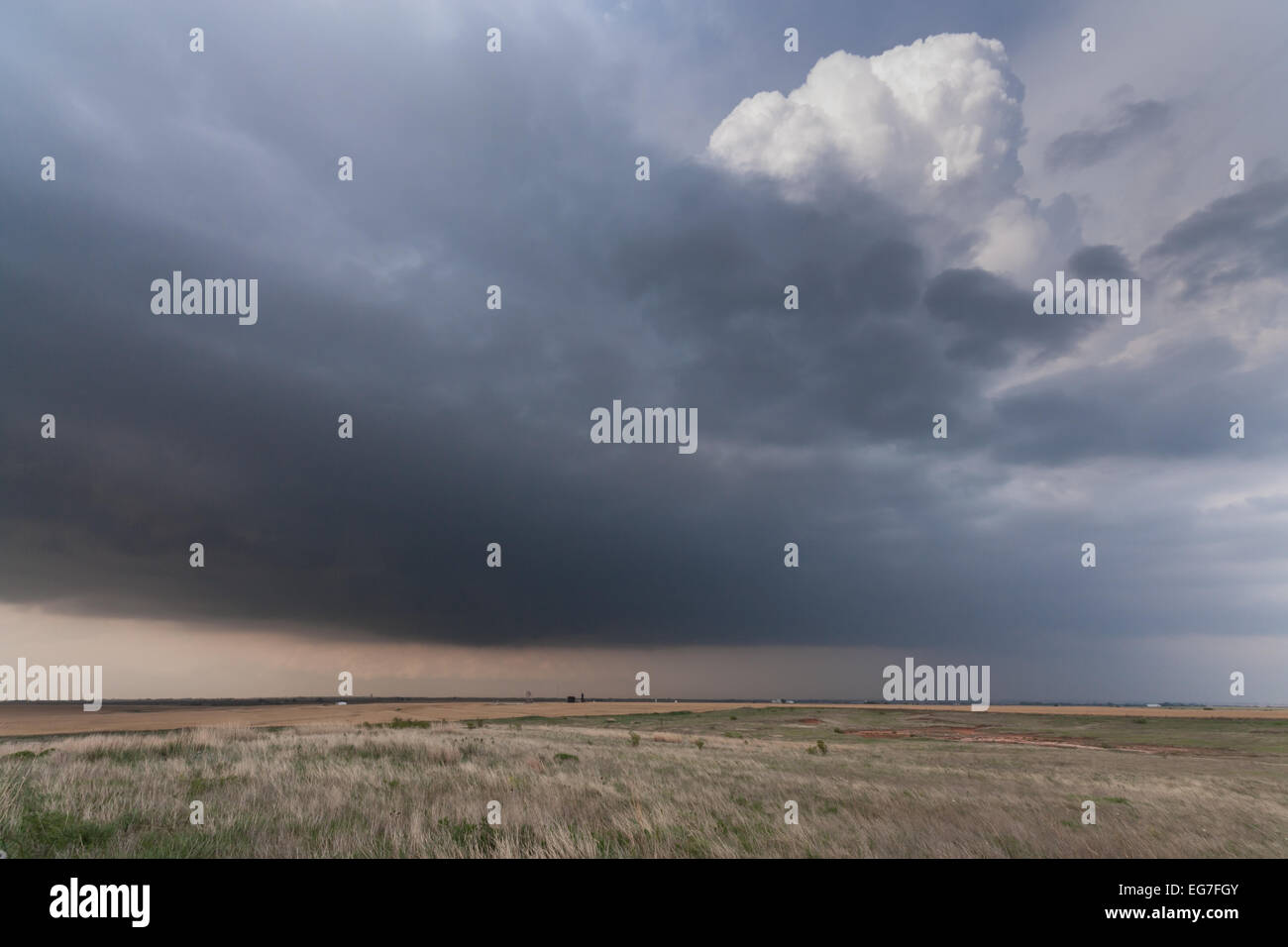 A powerful supercell thunderstorm takes shapes with a twisting updraft threatening to produce tornadoes Stock Photo