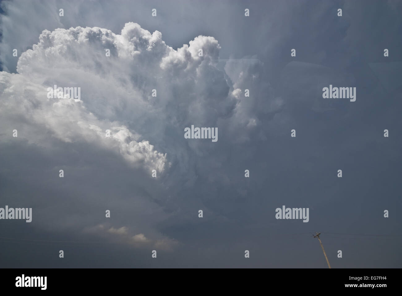 A powerful supercell thunderstorm takes shapes with a twisting updraft threatening to produce tornadoes Stock Photo