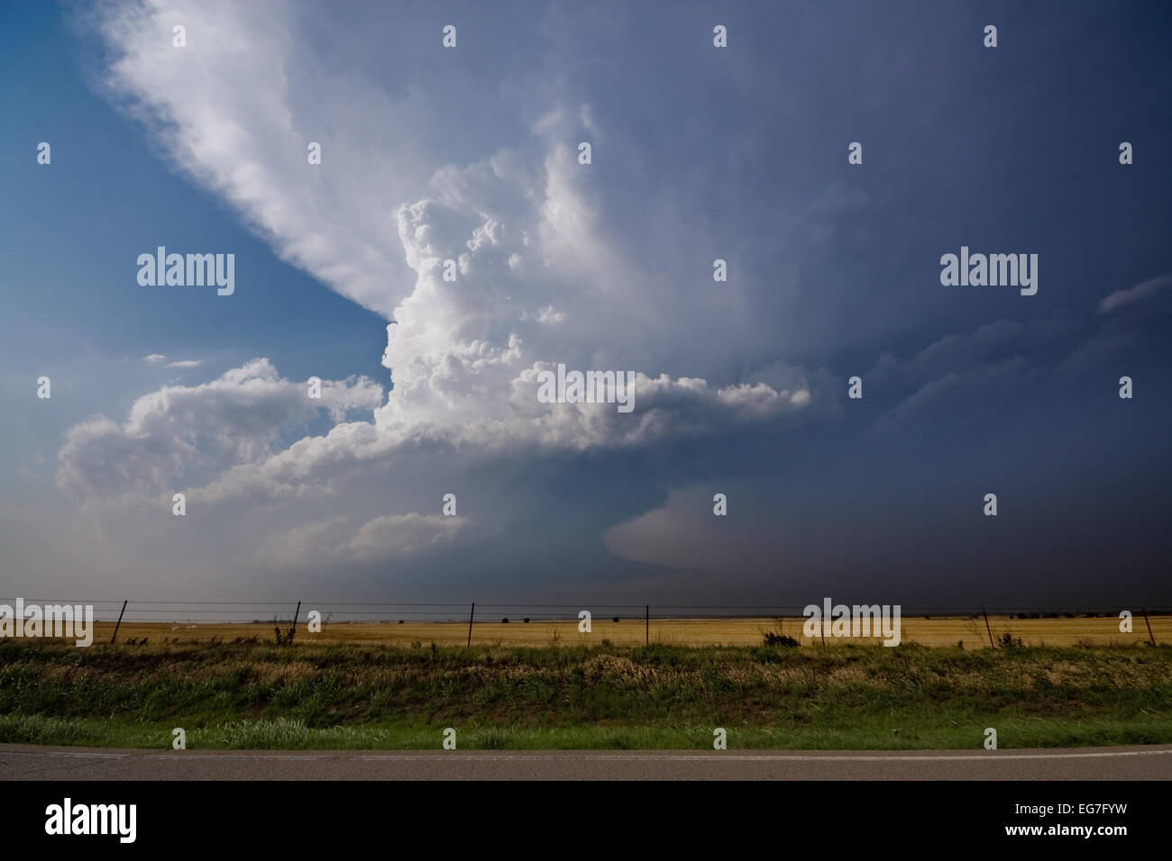 A powerful supercell thunderstorm takes shapes with a twisting updraft threatening to produce tornadoes Stock Photo