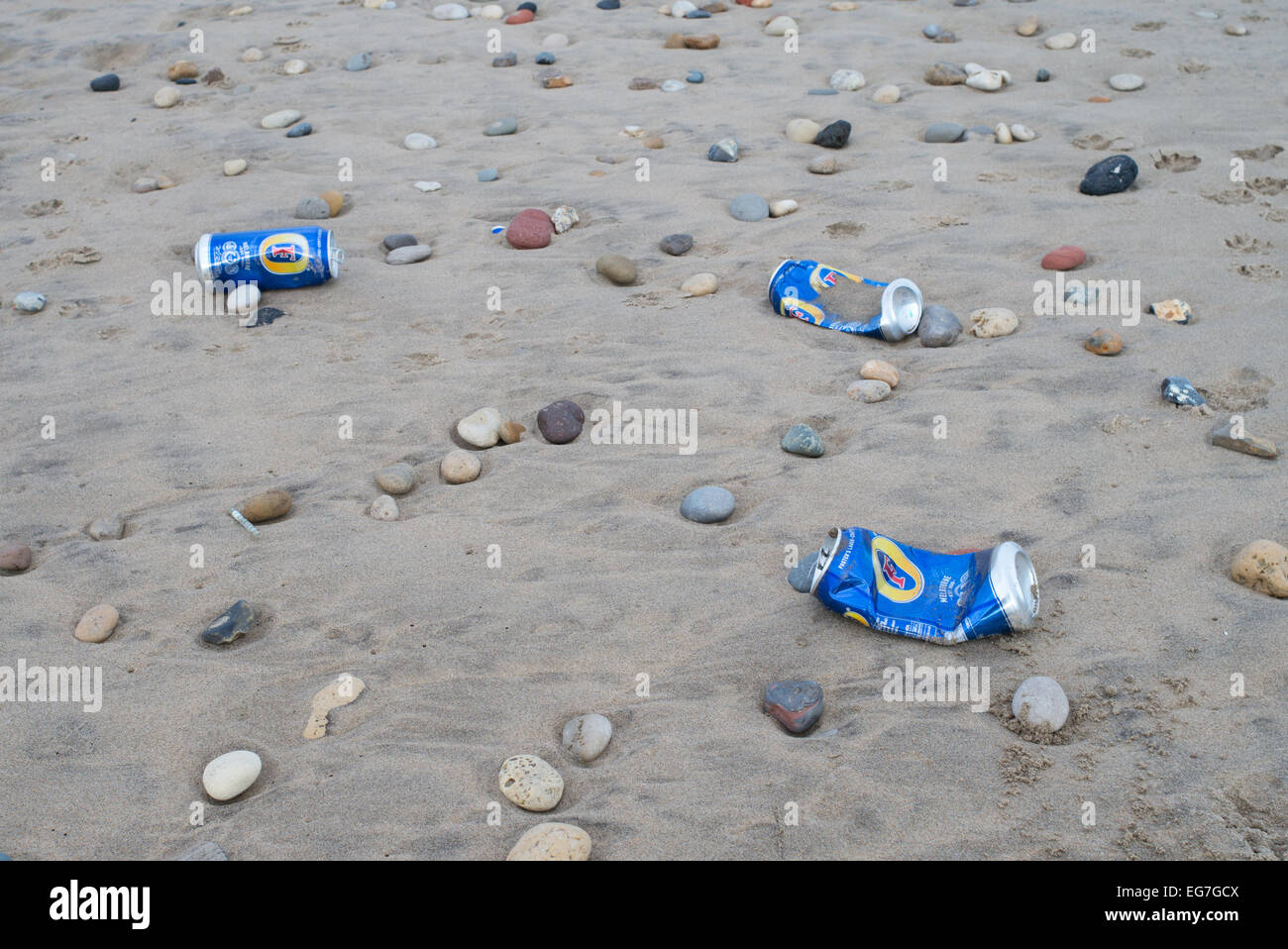 Empty beer cans on beach near Crimdon Dene, County Durham coast, England, UK Stock Photo
