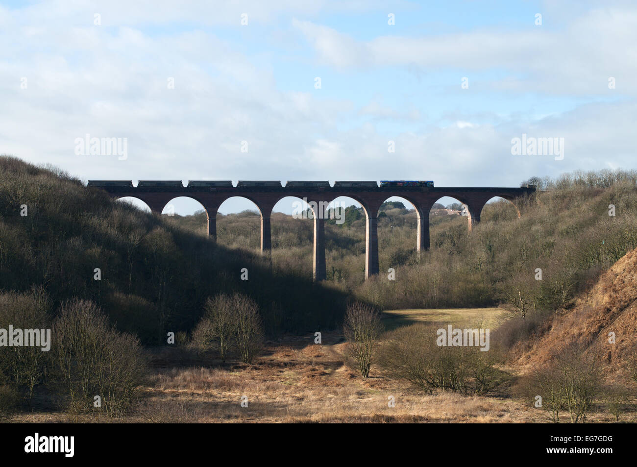 GBRf diesel powered freight train crossing Dene Mouth viaduct near Blackhall Colliery, Co. Durham, England, UK Stock Photo