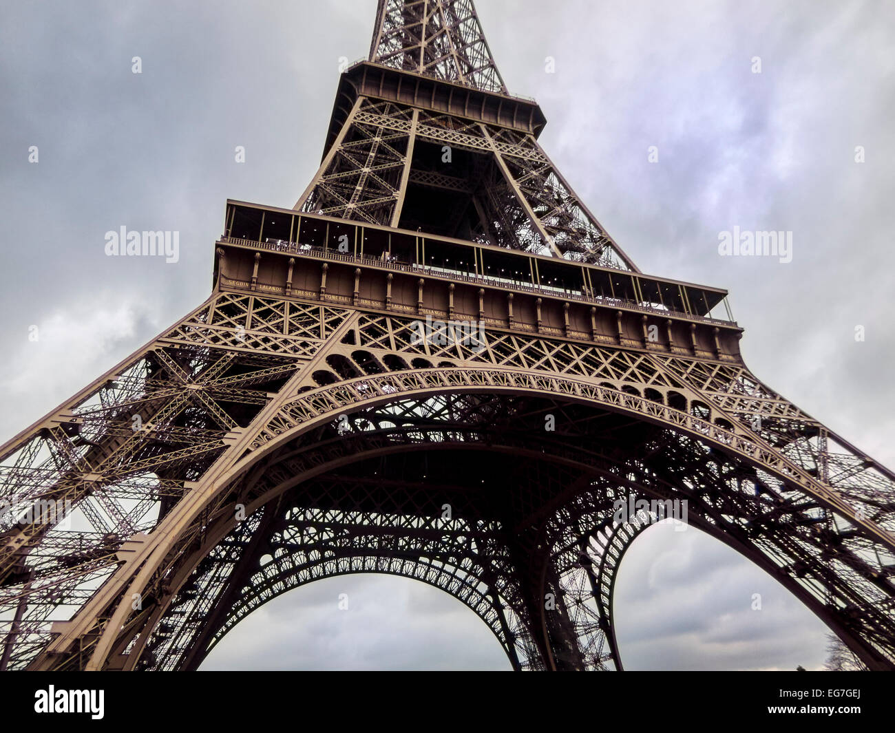 Low angle shot Eiffel Tower in Paris. Stock Photo