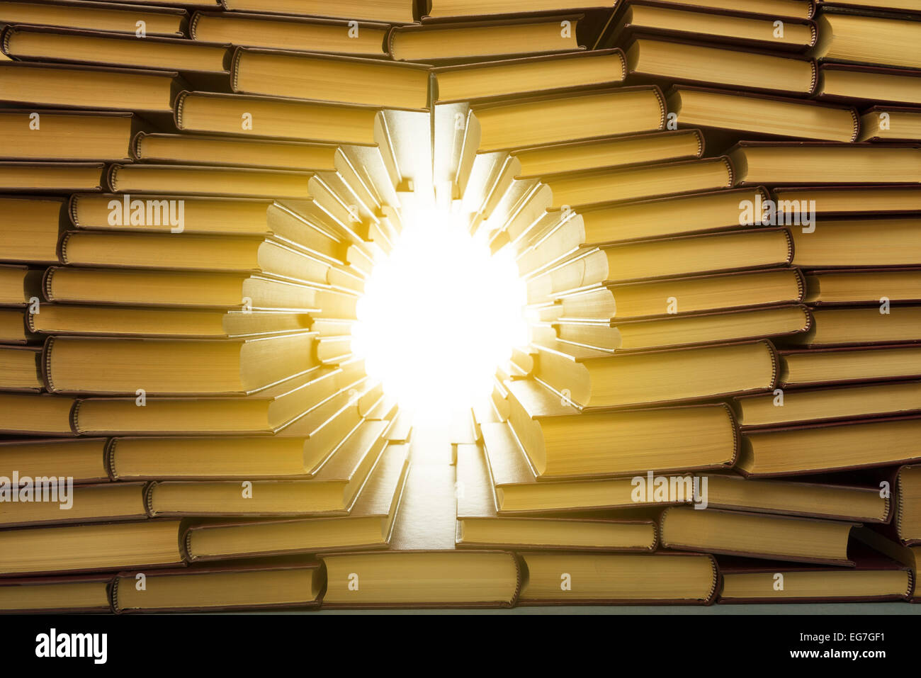 an open window in a wall of books Stock Photo