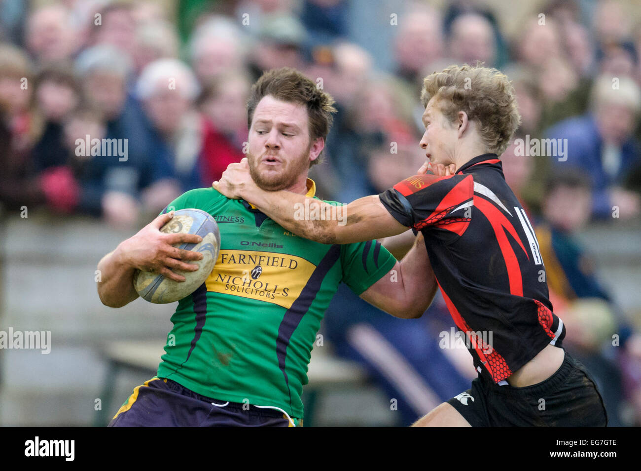 Rugby, player being tackled. Stock Photo