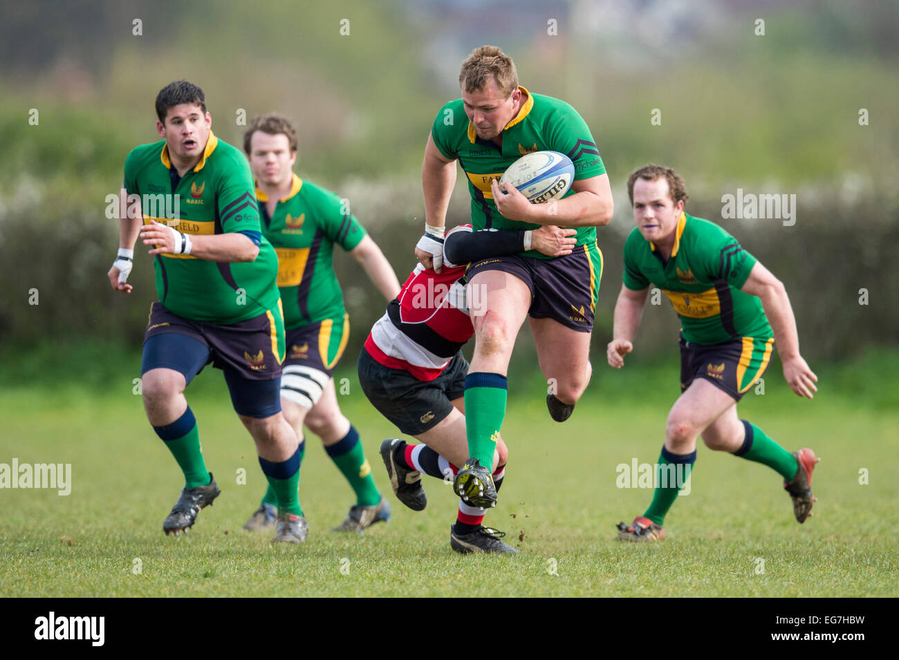 Rugby, player being tackled. Stock Photo