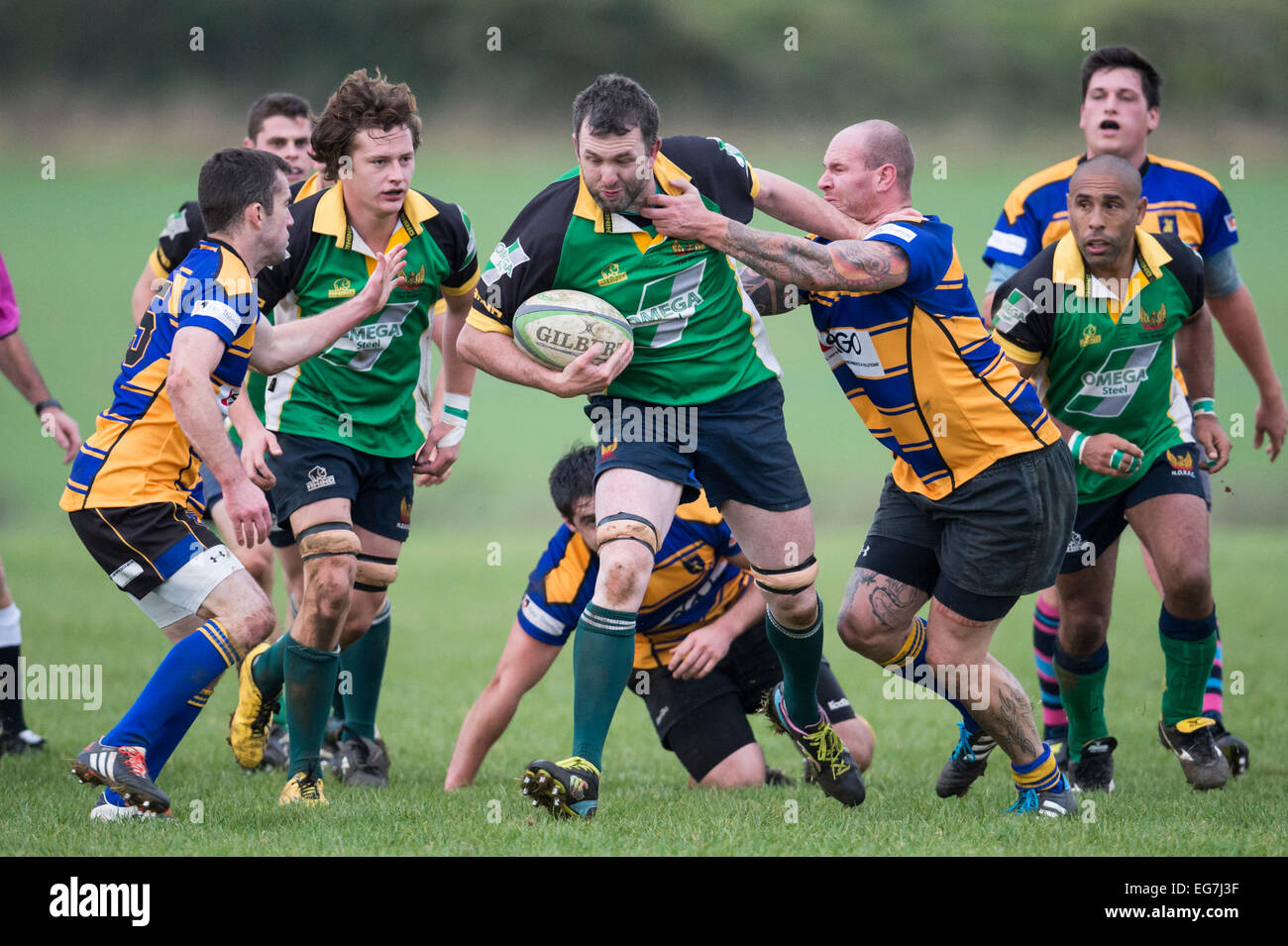 Rugby, player being tackled. Stock Photo