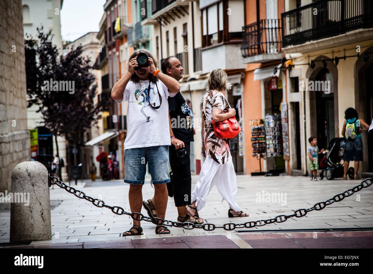 Tourist making a shoot, Girona Spain Stock Photo