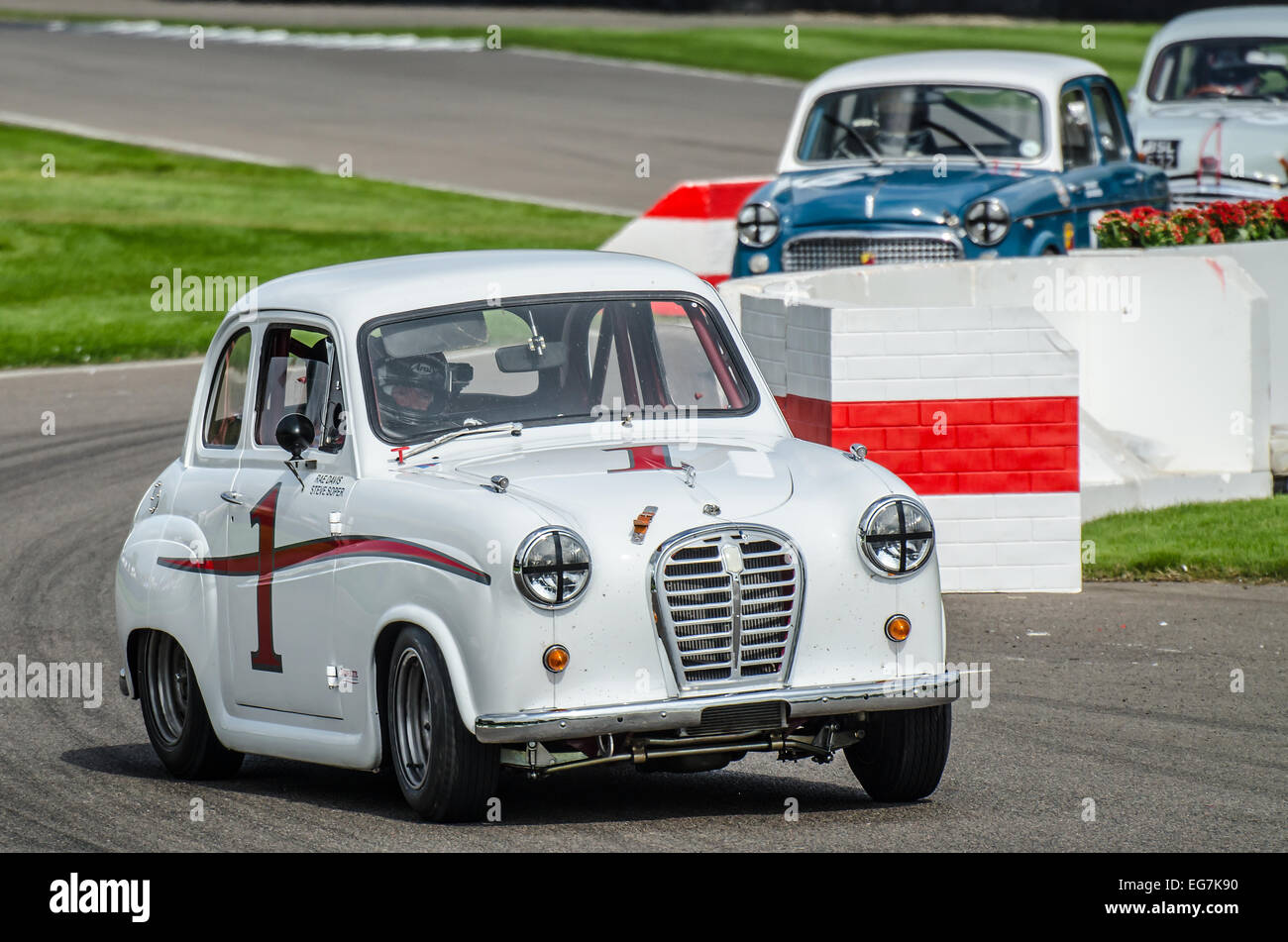 Austin A35 racing at the Goodwood Revival. Vintage motor car racing through the chicane Stock Photo