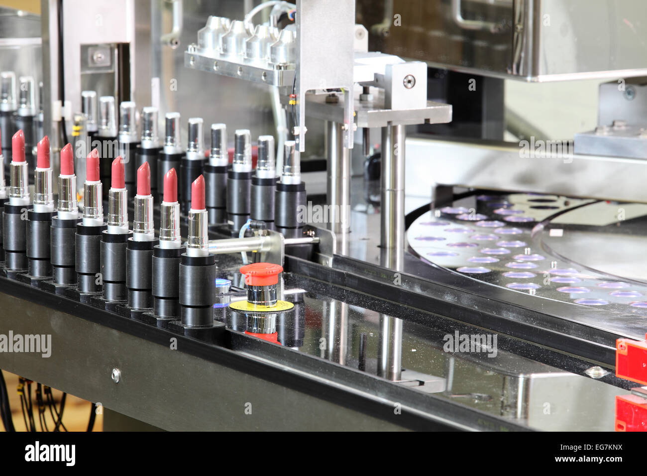 A lipstick packaging machine in a cosmetics factory Stock Photo Alamy