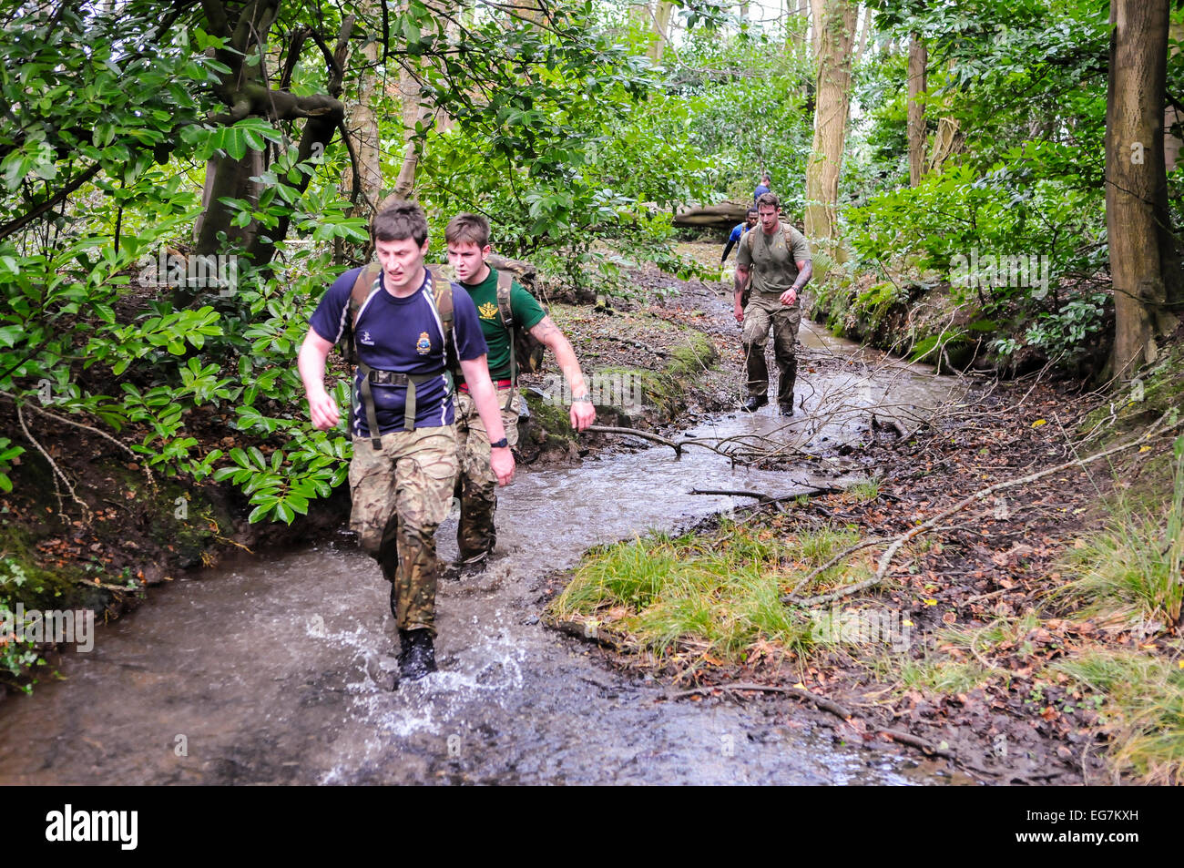 Bangor, Northern Ireland. 18th February, 2015. Soldiers run through a river during a cross-country exercise. Credit:  Stephen Barnes/Alamy Live News Stock Photo