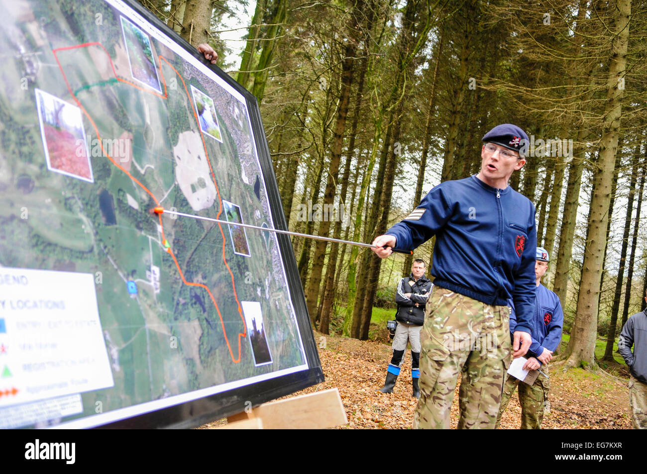 Bangor, Northern Ireland. 18th February, 2015. A sergeant major gives instruction to soldiers in advance of an exercise using a pointer and a map. Credit:  Stephen Barnes/Alamy Live News Stock Photo
